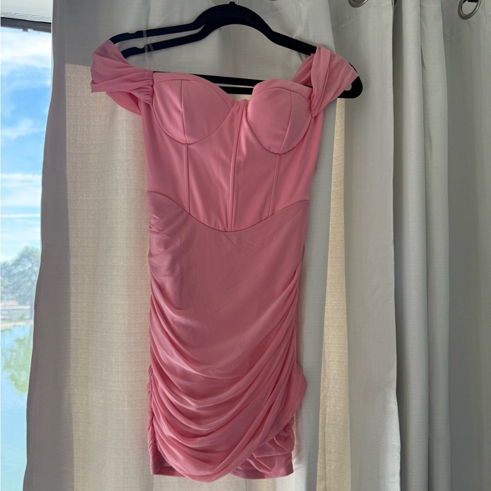 Pink mini dress stretchy material size medium 
New with tags
